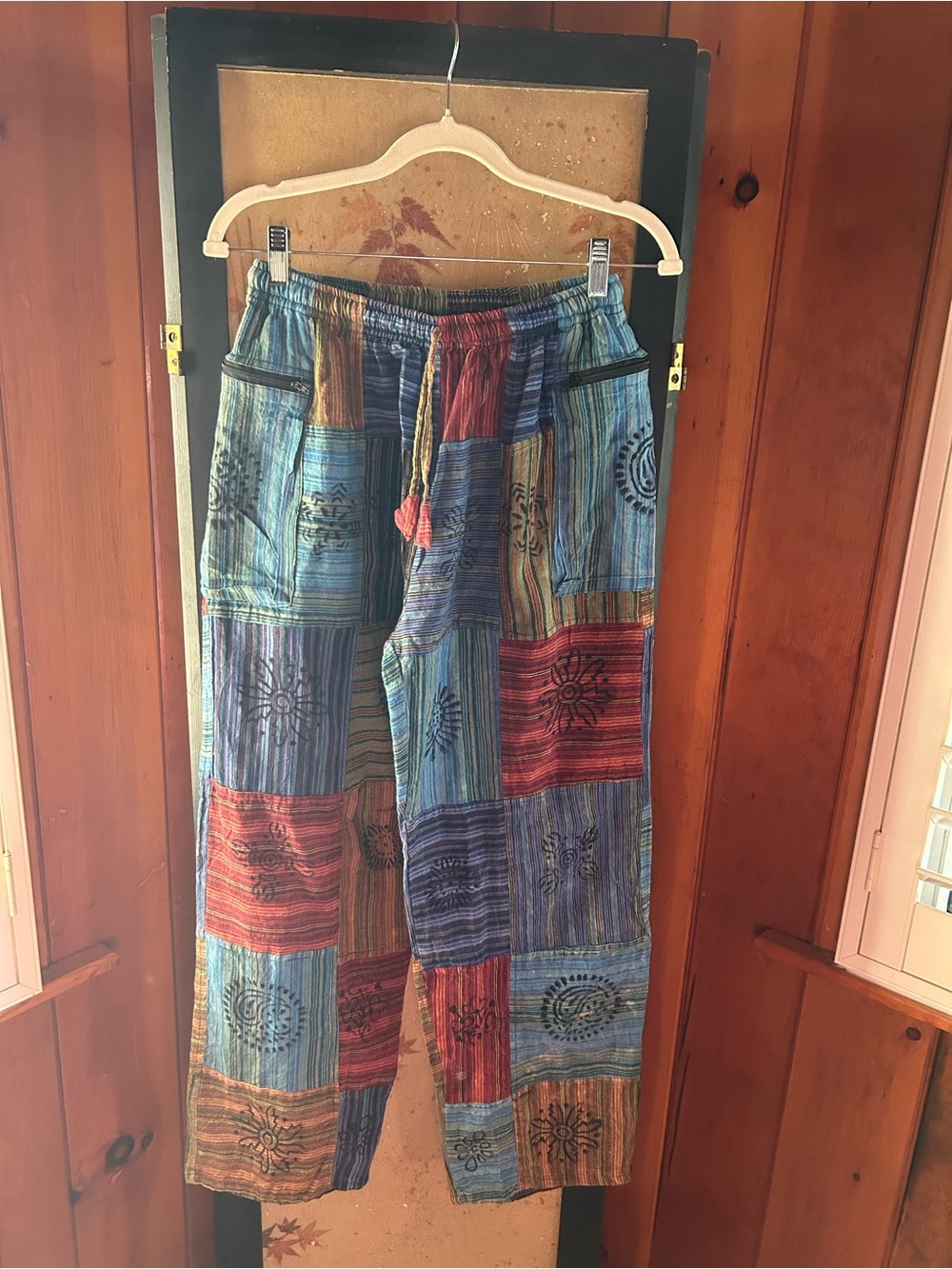 NWOT Kathmandu Multicolor Patchwork straight leg pants in Blue, Red & Green